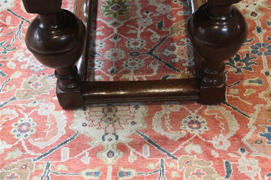 A mid 17th century Dutch oak draw leaf table extended 7ft 1.5in.